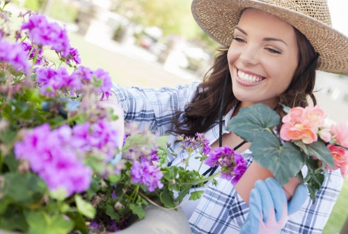 Landscaper reviewing a customer complaint about garden work